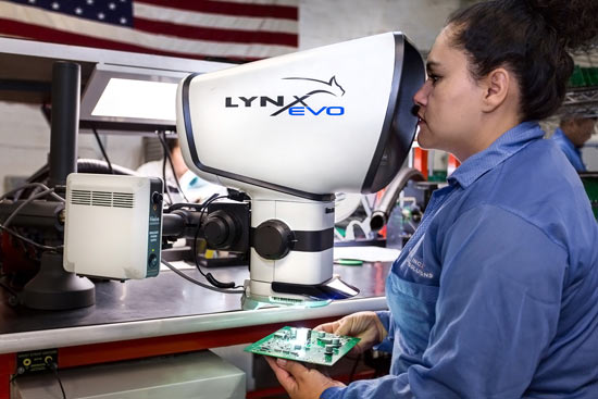 Laritech-operator-inspecting-PCBA